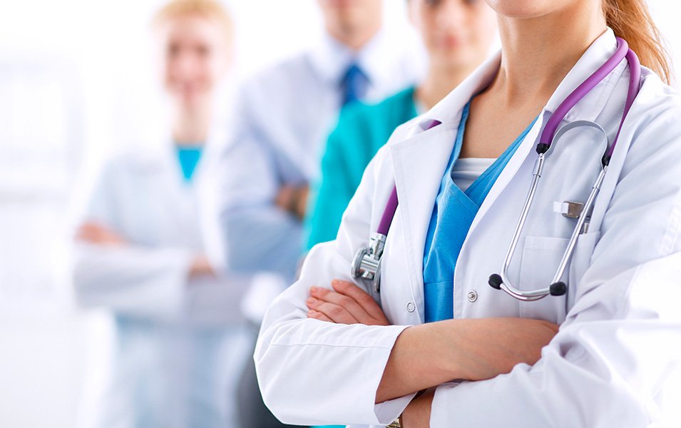 Doctors in white coats with stethoscopes, symbolizing onboard medical services | MSC Cruises Doctors in white coats with stethoscopes, symbolizing onboard medical services | MSC Cruises