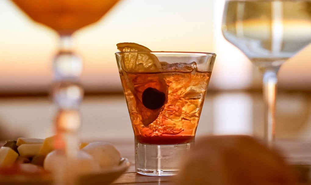 A refreshing cocktail with sunset views onboard | MSC Cruises A refreshing cocktail with sunset views onboard | MSC Cruises