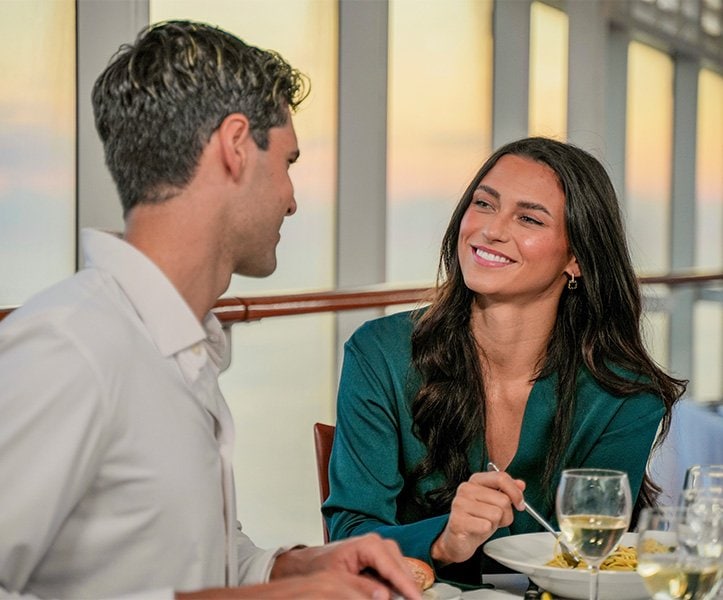 Couple having dinner on cruise ship | MSC Cruises Couple having dinner on cruise ship | MSC Cruises