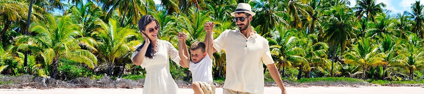 Winter cruises, cruise holiday, family cruises, family on beach with palmtree | MSC Cruises